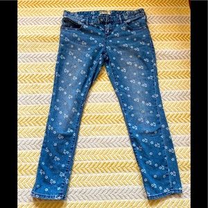 Free People floral print ankle jeans.